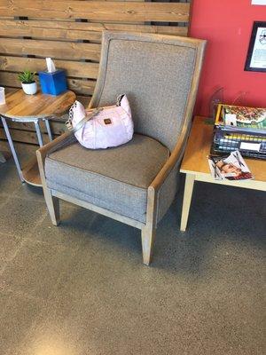 My purse in a normal sized chair (one of two they have in the waiting area).