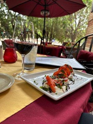 Caprese salad and a lovely glass of house Merlot!  Definitely my happy place in Addison Circle