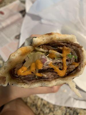 Beef gyro with hot sauce