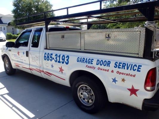 GARAGE DOOR SERVICE REPAIR REPLACE BROKEN SPRINGS OPENERS DOORS ....................CALL TODAY       813 685  3193