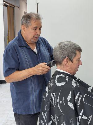 Richard is a master barber and has been at the shop over 40 years!