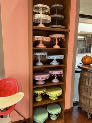 You can rent (borrow) a cake stand during a birthday party. MUST return within a few days or you will have to pay the full price.