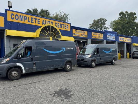 Amazon prime vehicles on their way out after getting fully serviced.