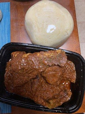 Tomato stew with assorted meats (fish, beef, cow skin)  And fufu