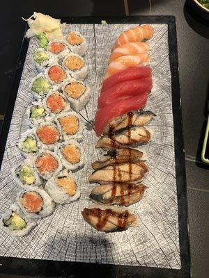 Spicy tuna spicy salmon and avocado rolls with unagi, salmon and tuna nigiri