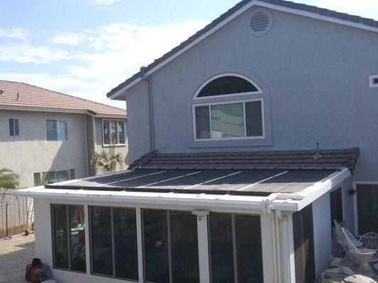 Solar pool heater on patio