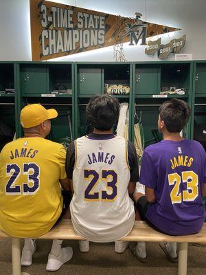 Seated in front of Lebron's high school locker