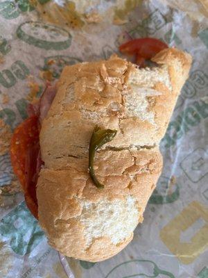 Stale bread and big jalapeño stem. Not pictured was the hair that I pulled out of my mouth from a bite.