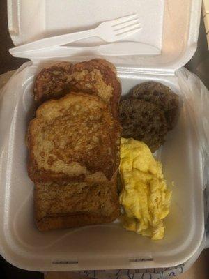 French toast plate, turkey sausage, we'll-seasoned scrambled eggs.