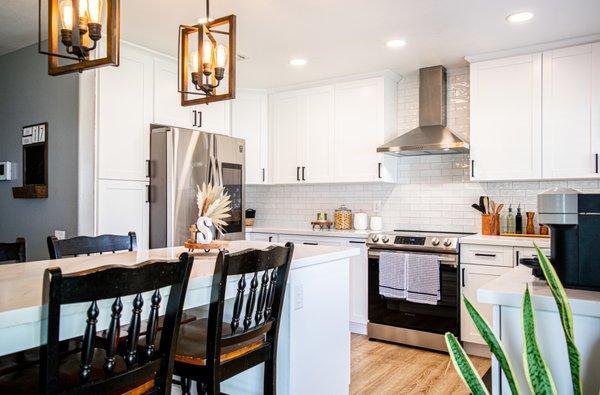 Farmhouse style kitchen with White Shaker Cabinets