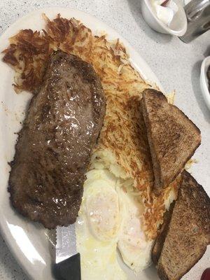 Steak and hash brown. The hash browns took up nearly the whole plate!