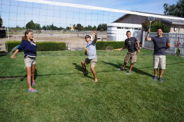 Playing badminton and volleyball with the Family.