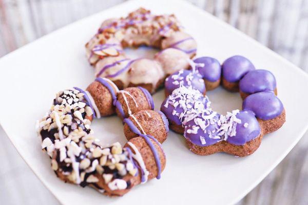 Ube Mochi Donuts flavors: Cafe Ube, Macadamia Nut, & Ube Coconut!