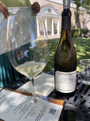 Bottle and glass of their 2019 Chardonnay at Monticello Vineyards - Corley Family Napa Valley in Napa.