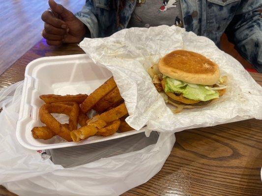 Shrimp and chicken burger with onion rings