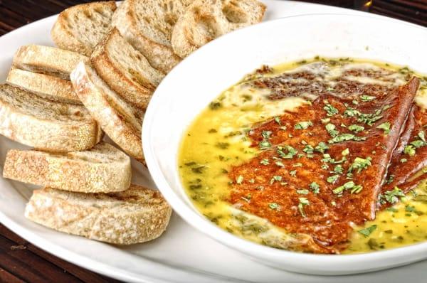 Queso Borracho: Partly Toasted Melted Cheese with Tequila Chimichurri