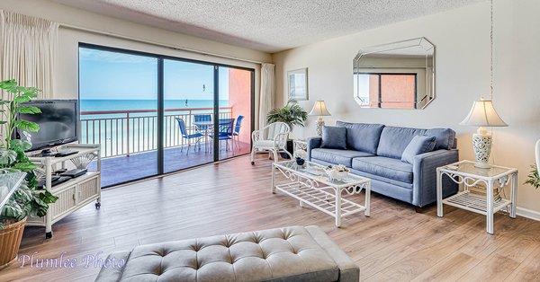 Enjoy all the comforts of home and a private balcony with gorgeous views of the beach and sunsets.