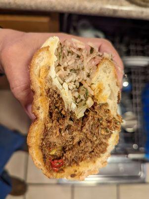 Slow-roasted pork shoulder sandwich