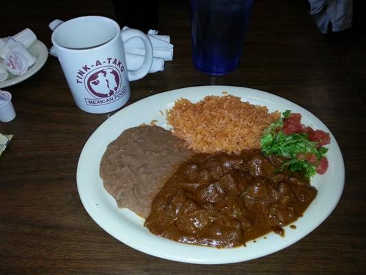 carne guisada plate, rice, and beans at tink  a tako.