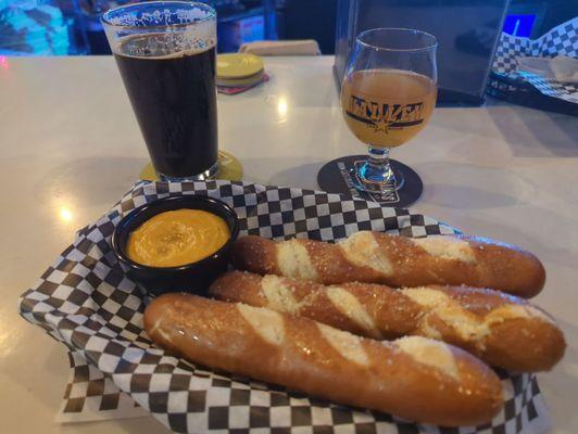 Pretzel sticks and beer