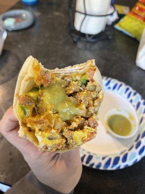 Arlington breakfast burrito with their thick green sauce