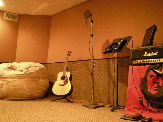 Our recording Booth at The Sound Bakery with a Marshall Half Stack and a Neuman TLM 103 Condenser Mic.