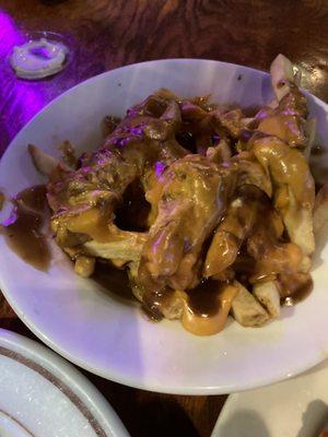 Fries with gravy and cheese