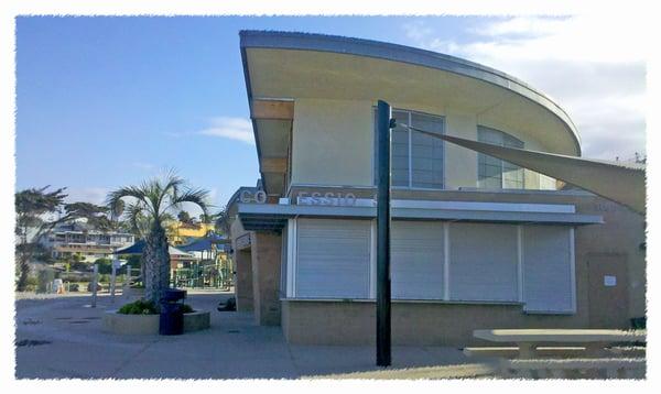 There is a covered patio and a playground area too!