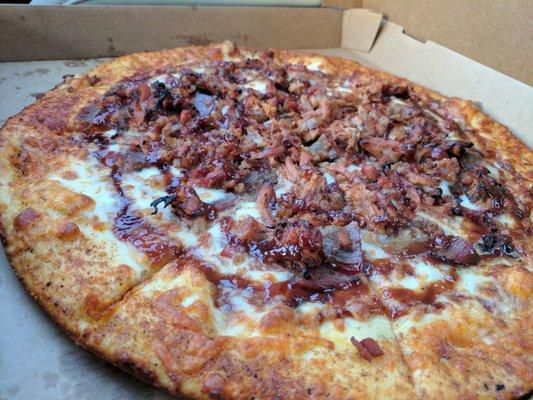 Smokehouse Pizza is good but they didn't put enough meat. Look at how much crust there is.