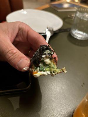 Inside of a zucchini fritter with caviar