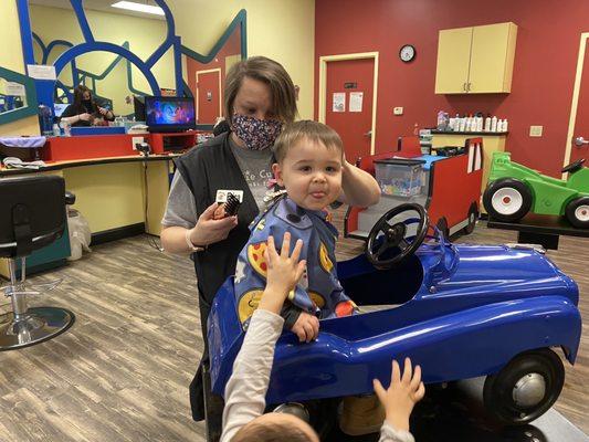 He kept moving around and being distracted by his little brother but Erica still managed to give him a great haircut!