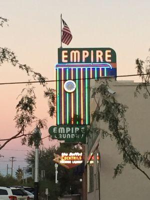 Restored Empire sign  at dusk