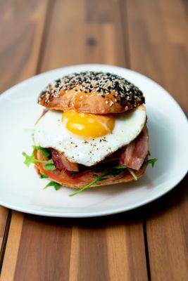 4oz angus breakfast burger, apple smoked wood bacon, cheddar cheese, chipotle aioli, arugula, tomato, on a homemade brioche bun