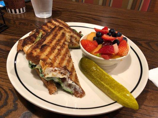 California Grille Panini On Whole Grain Harvest Panini with side of Fruit bowl