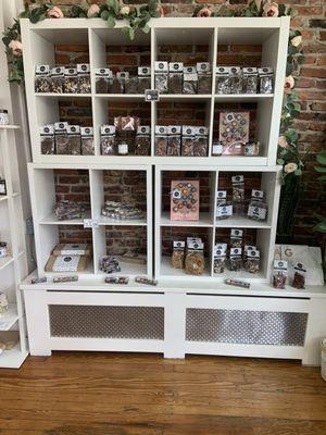 Shelf of chocolate bars and bonbons.