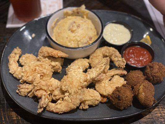 Fried Jumbo Shrimp with loaded mashed potatoes and hushpuppies