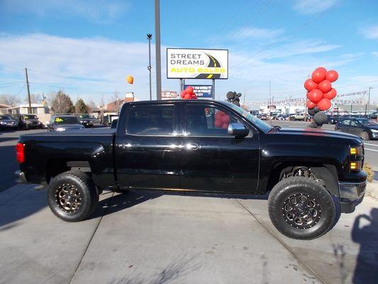 Lifted beauty! Come take a drive in this 2014 Chevy Silverado