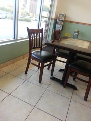 Regular chairs and tables, basically a take out joint.