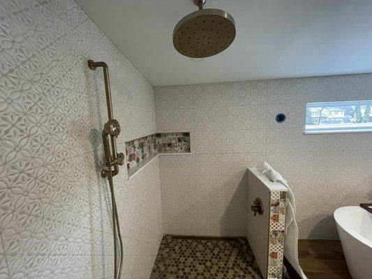 Newly renovated bathroom with new shower fixtures