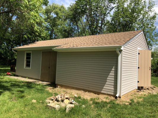 Side view of addition, framing, roofing and siding