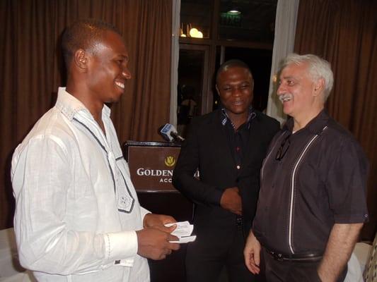 Charles picture (left) Manages Operations for Youth World, Mario Pugulese board member, investor, business owner in Ghana