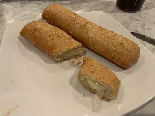 Cheese breadsticks. Taste amazing with or without their signature sauce.