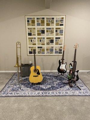 This quilt was a beautiful addition to our home music "stage".  Plus, I received 20% off their already low price!  Thanks Running Stitch!