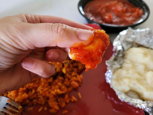 A perfect bite of fufu with tomato stew!