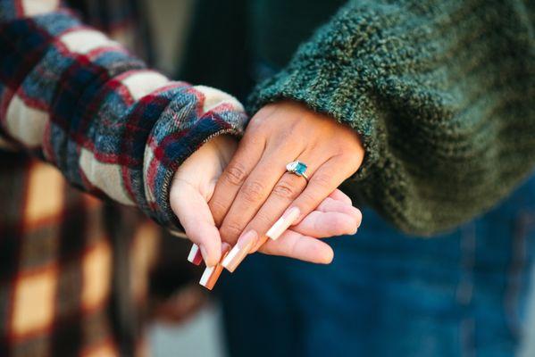 Toi et moi custom ring.   Pear shaped lab grown diamond + emerald shaped blue topaz