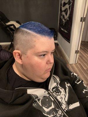 Clipper fade cut , hard part and vivid fashion blue.