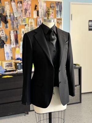 Bespoke all black womens custom three piece suit. British fabric, matching vest, 2 button closure.