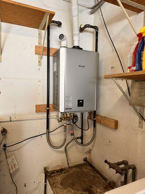 Water heater Installation. Replaced an old 40 gallon with this tankless.