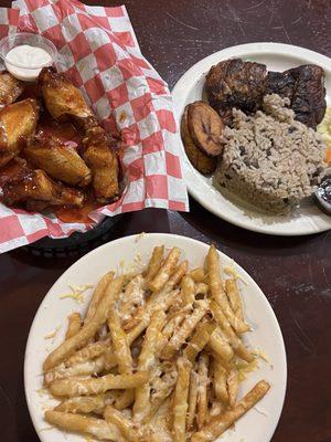 Cheese fries, wings, and jerk chicken