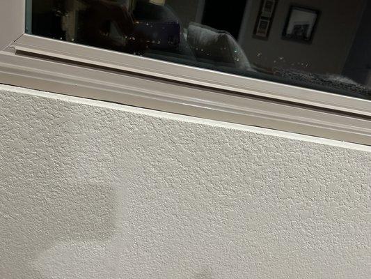 missing caulk along bottom of window